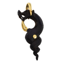 Ebony gold and ruby serpent pendant