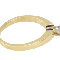 Diamond solitaire ring in yellow and white gold