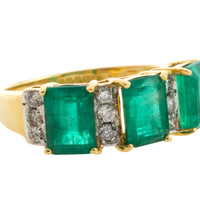 Emerald and diamond ring in 18 carat gold