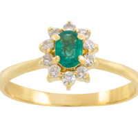 Emerald and diamond cluster ring in 18 carat gold