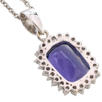 Tanzanite and diamond pendant in white gold
