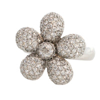 White gold flower ring with diamonds