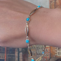 14 karaat gouden armband met turkoois stenen