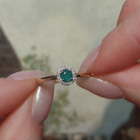 Vintage smaragd en diamanten cluster ring