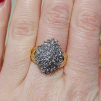Diamond navette cluster ring in 18 carat gold