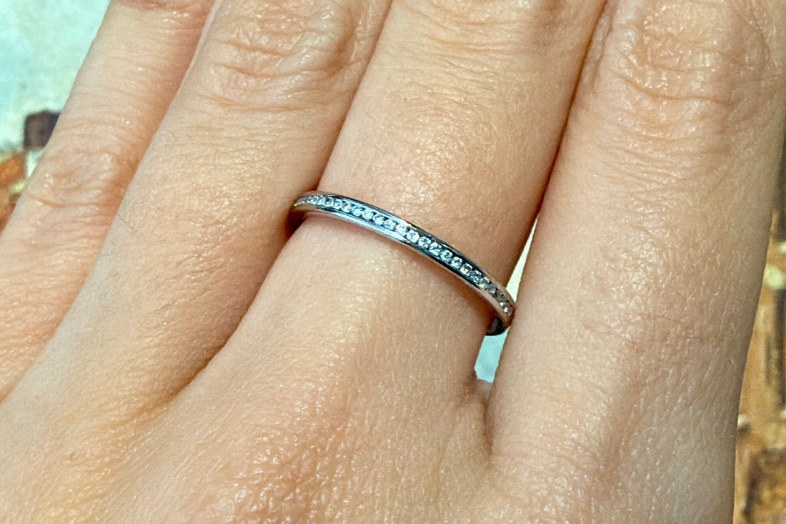 18 carat gold half eternity band with diamonds