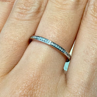18 carat gold half eternity band with diamonds