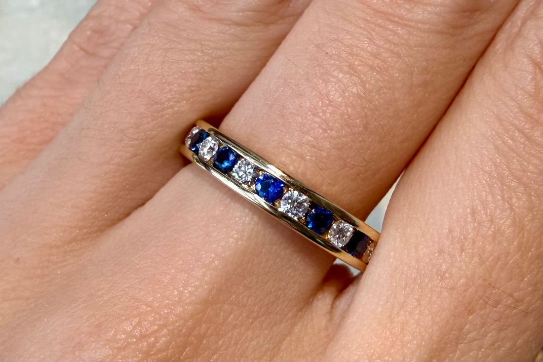 Sapphire and diamond eternity band in 18 carat gold
