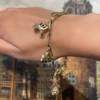 Vintage charm bracelet in 14 carat gold-Bracelets-The Antique Ring Shop