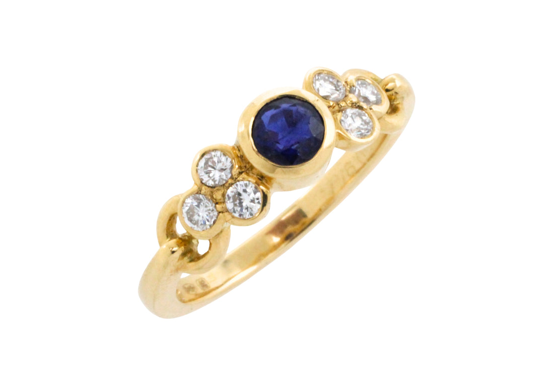 Sapphire and diamond ring in 18 carat gold