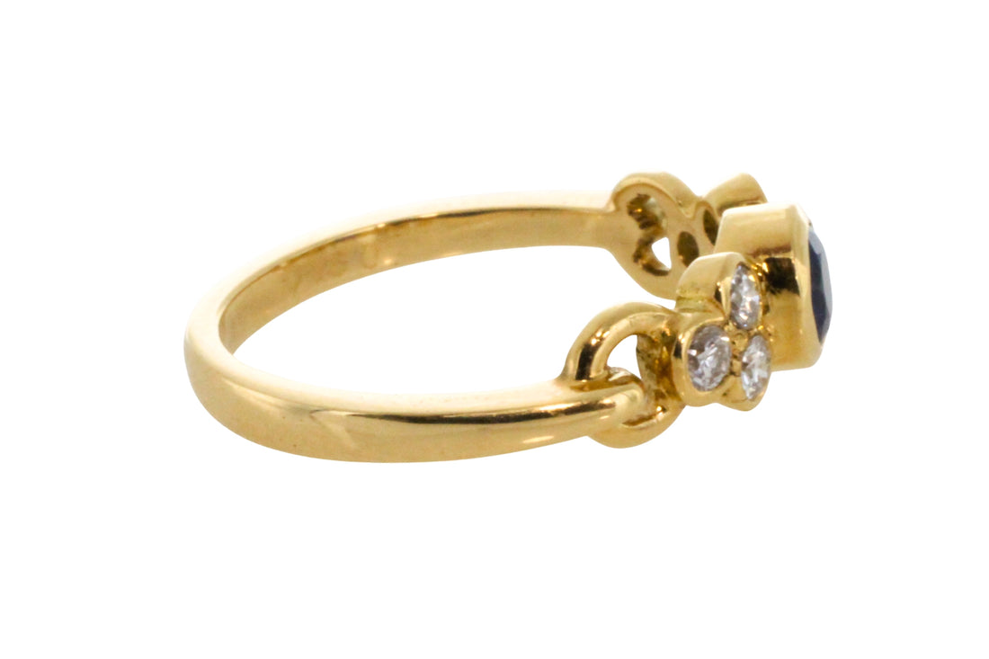 Sapphire and diamond ring in 18 carat gold