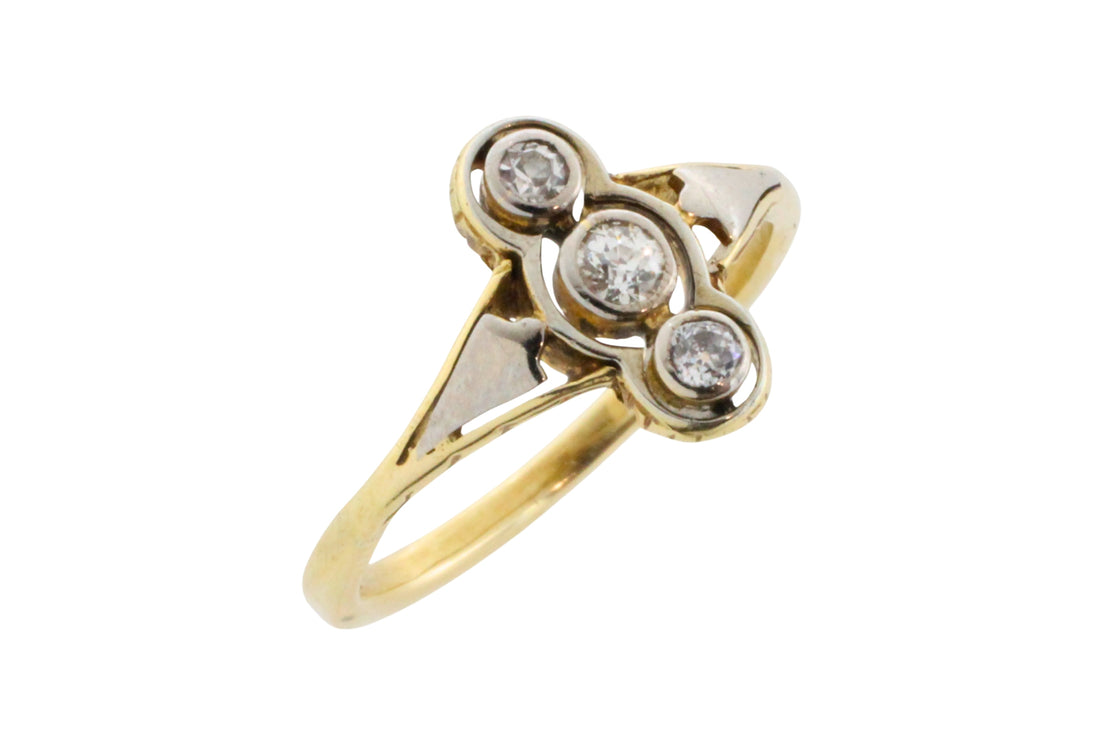 Antique diamond three stone ring in 14 carat gold