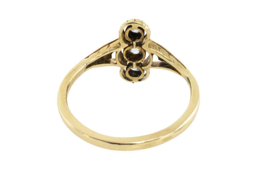 Antique diamond three stone ring in 14 carat gold