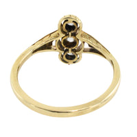 Antique diamond three stone ring in 14 carat gold