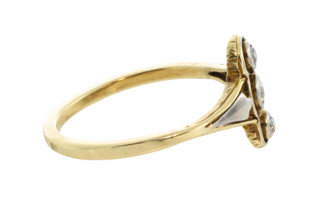 Antique diamond three stone ring in 14 carat gold