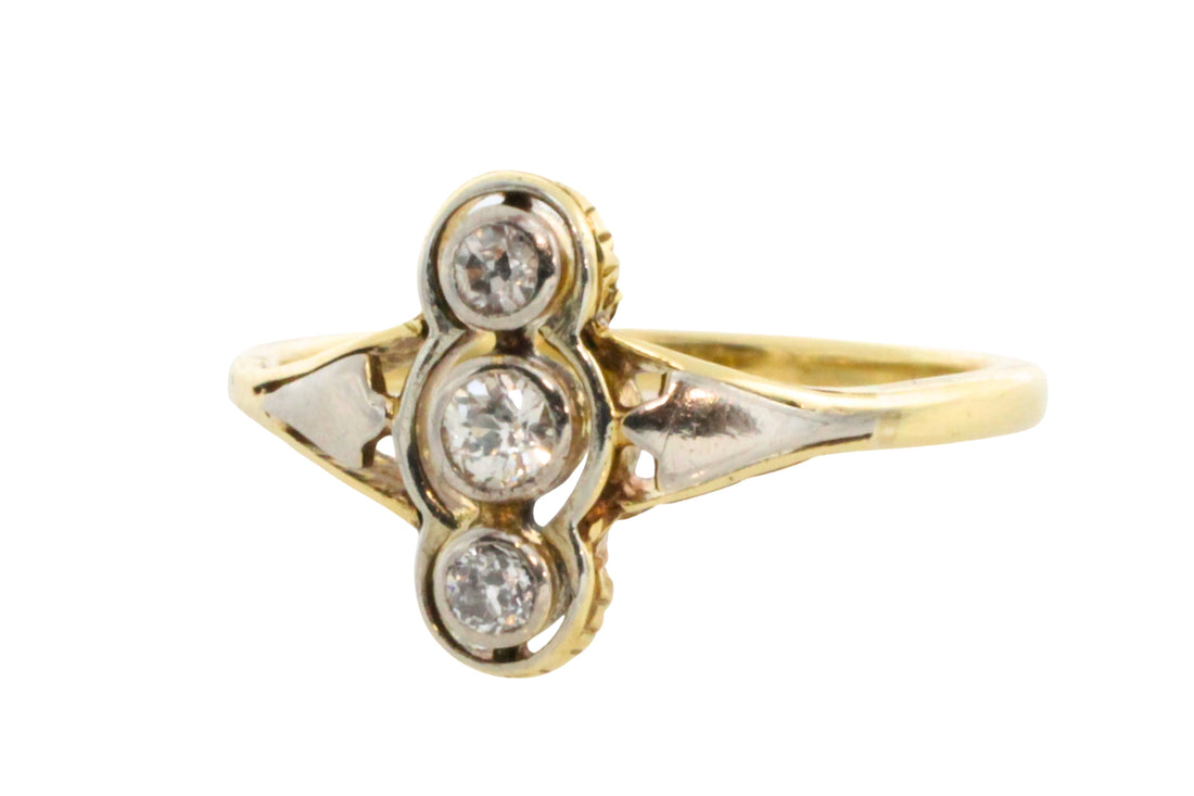 Antique diamond three stone ring in 14 carat gold