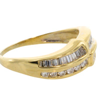 Baguette and brilliant cut diamond ring in 18 carat gold