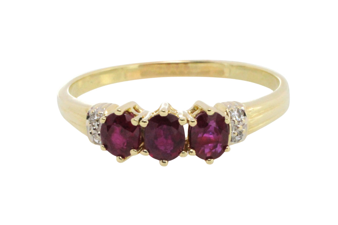 Ruby and diamond ring in 14 carat gold