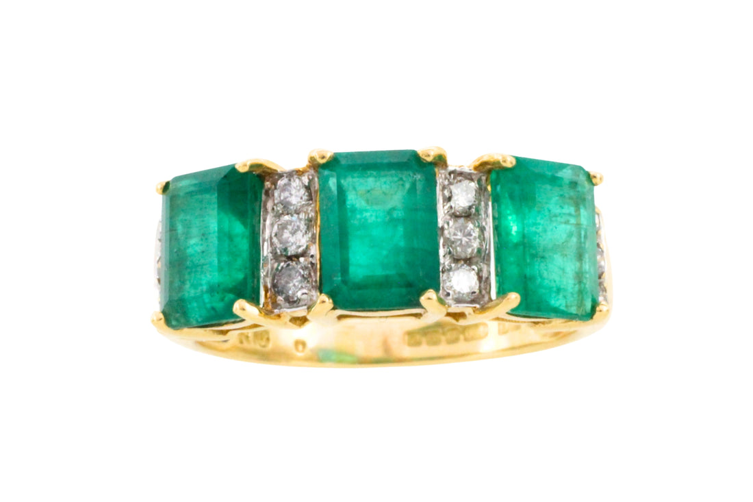 Emerald and diamond ring in 18 carat gold