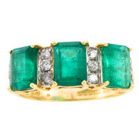 Emerald and diamond ring in 18 carat gold