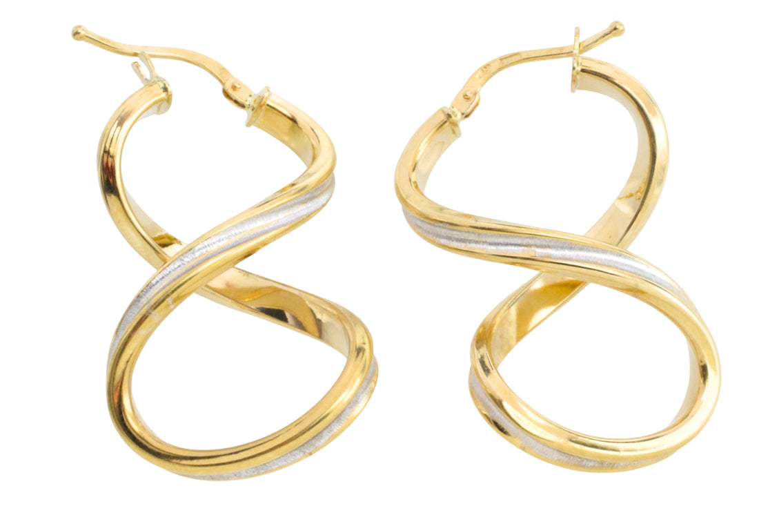 Spiral earrings in yellow and white gold