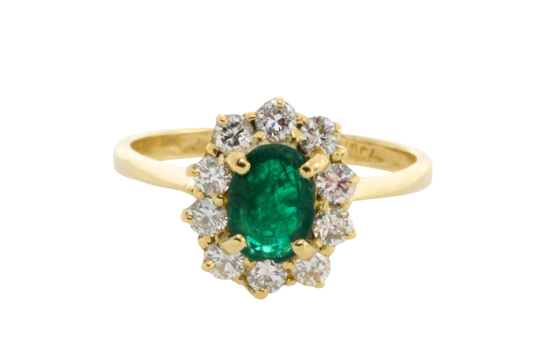 Vintage emerald and diamond ring in 18 carat gold
