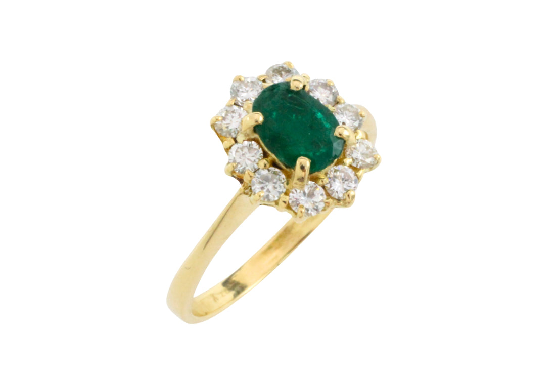 Vintage emerald and diamond ring in 18 carat gold