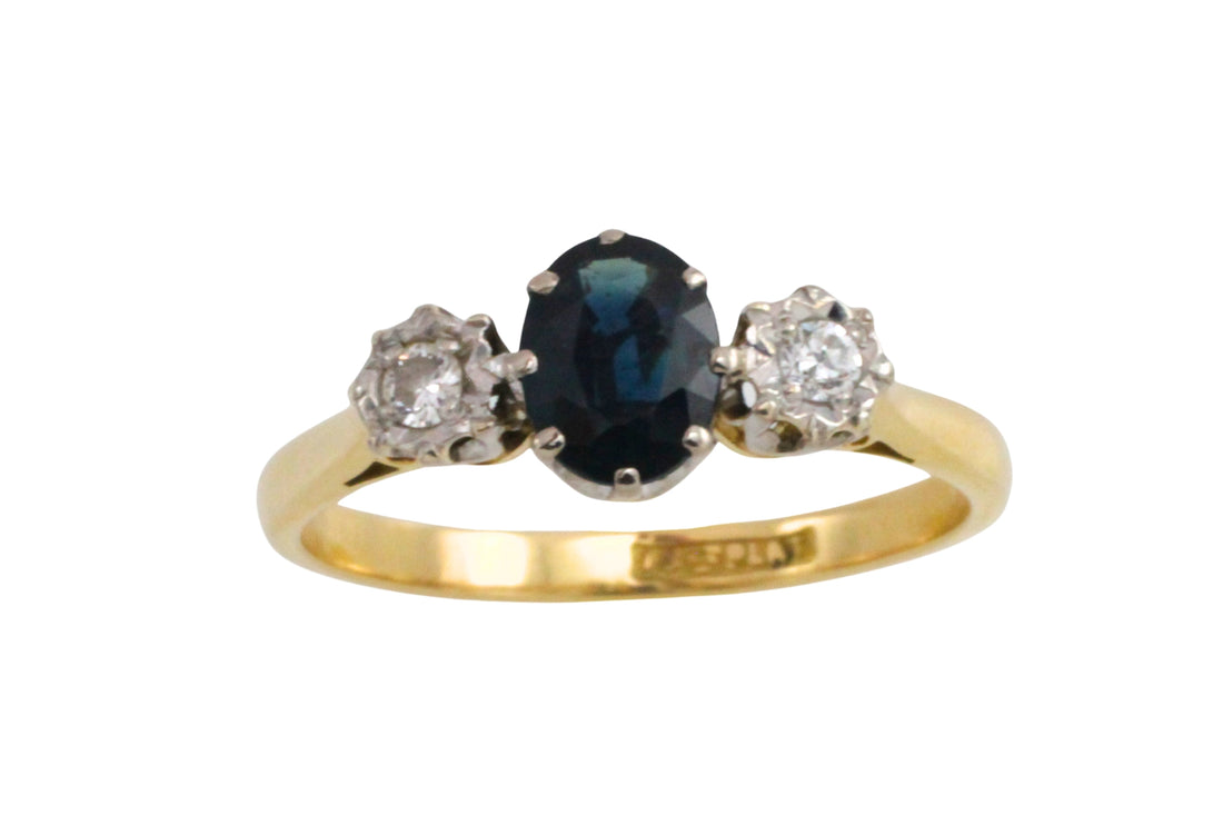 Vintage three stone sapphire and diamond ring