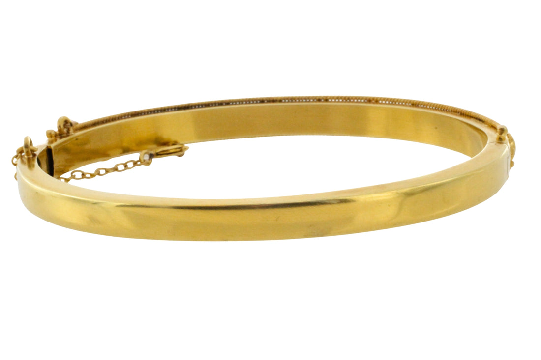 Vintage hinged bracelet in 14 carat gold