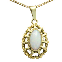 Cabochon opal pendant in 14 carat gold