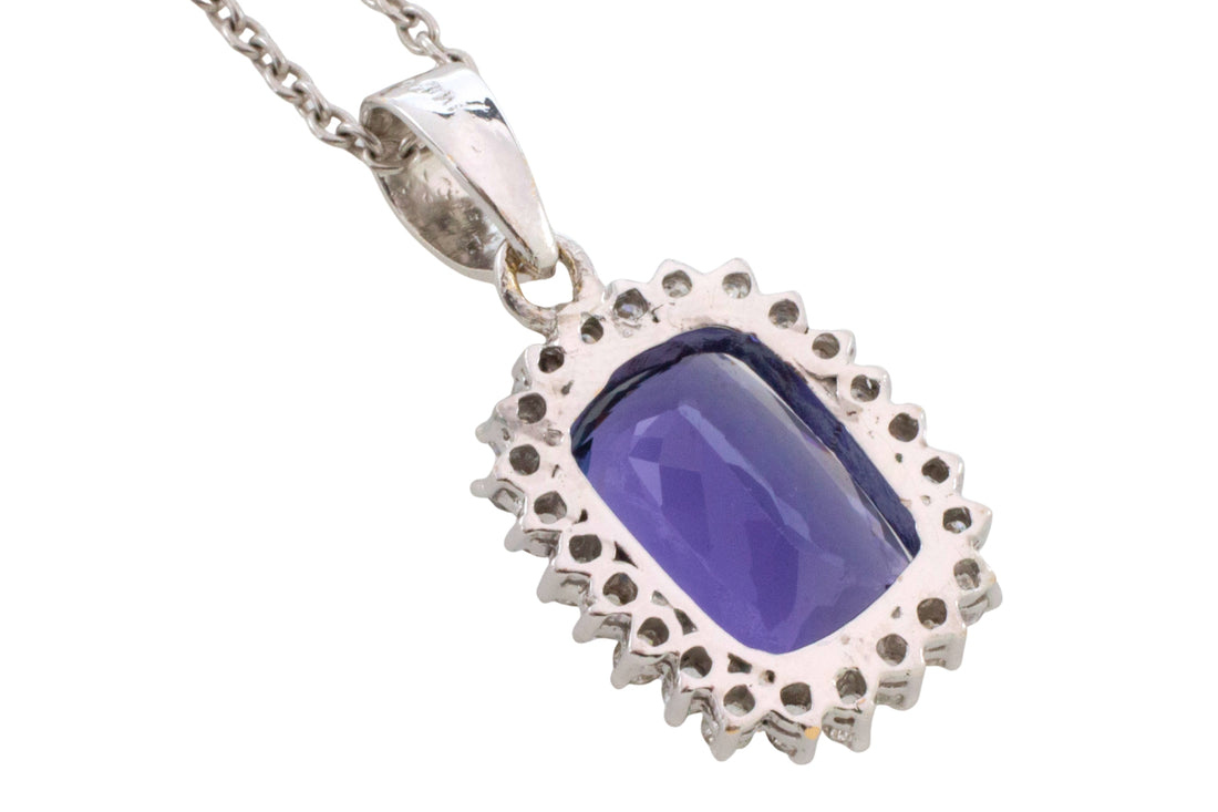 Tanzanite and diamond pendant in white gold