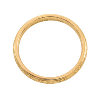 Vintage 18 carat gold band with motif