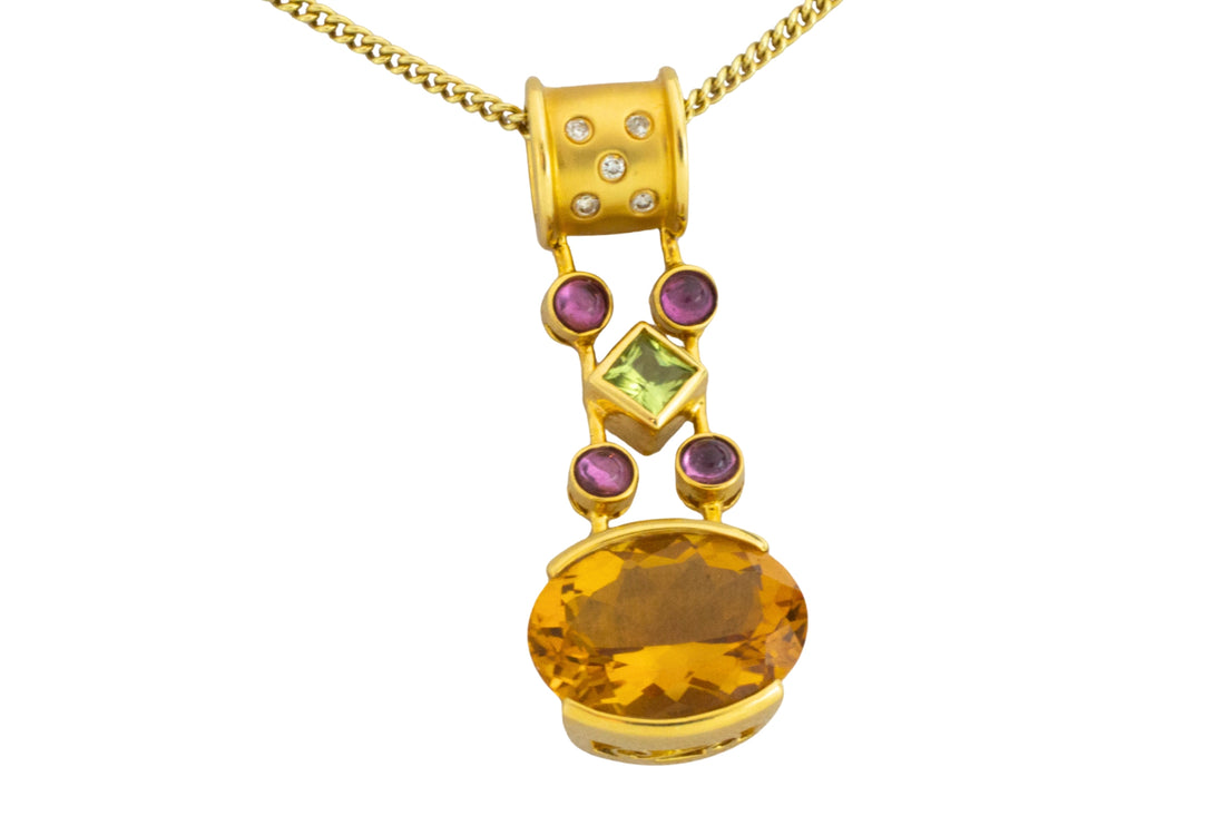 Gold pendant with citrine amethyst peridot and diamonds