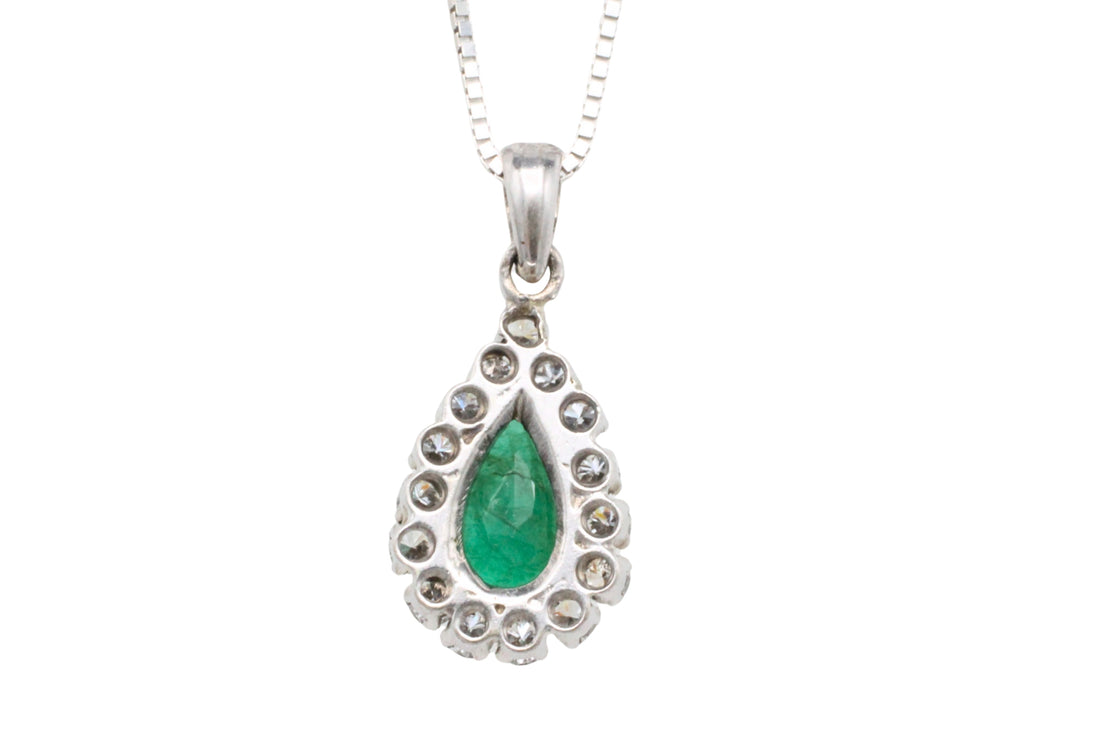 White gold emerald and diamond pendant