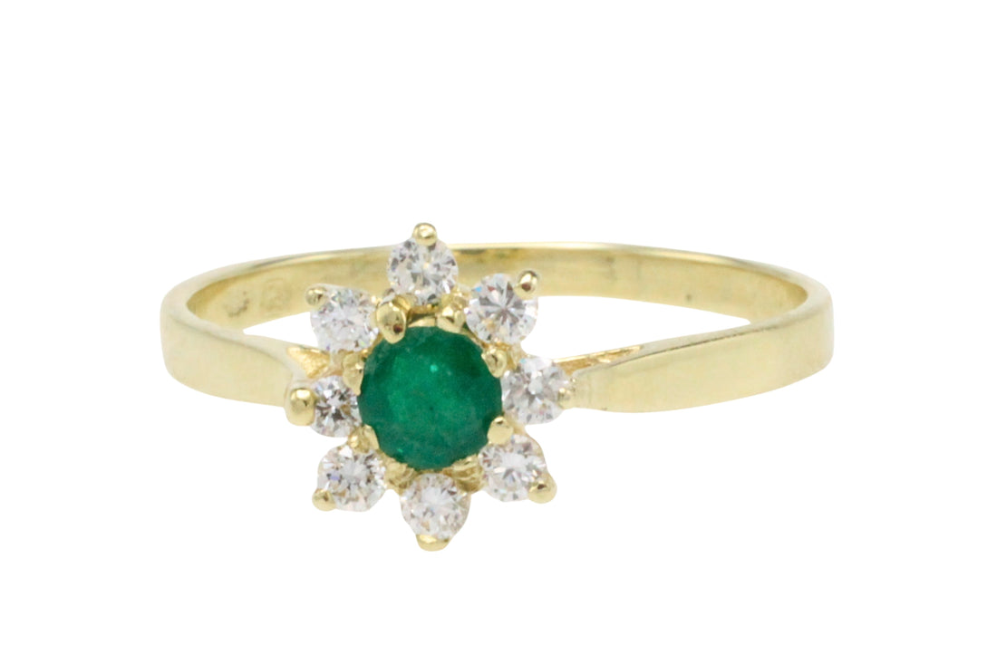 Emerald and diamond cluster ring