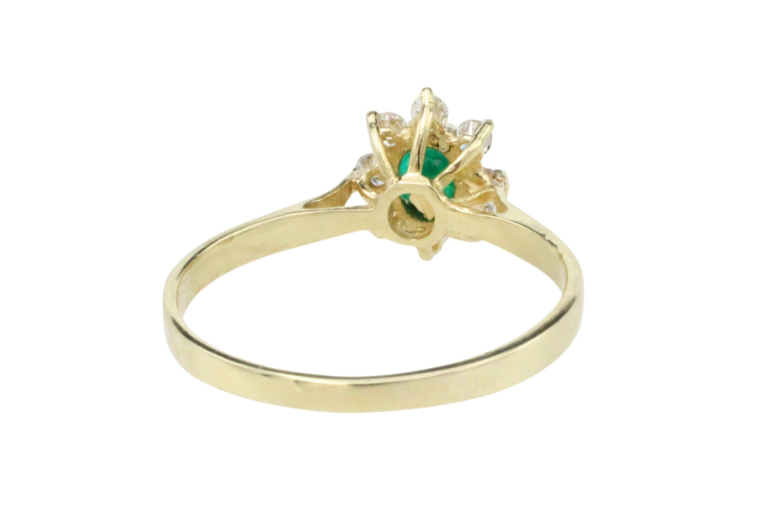 Emerald and diamond cluster ring