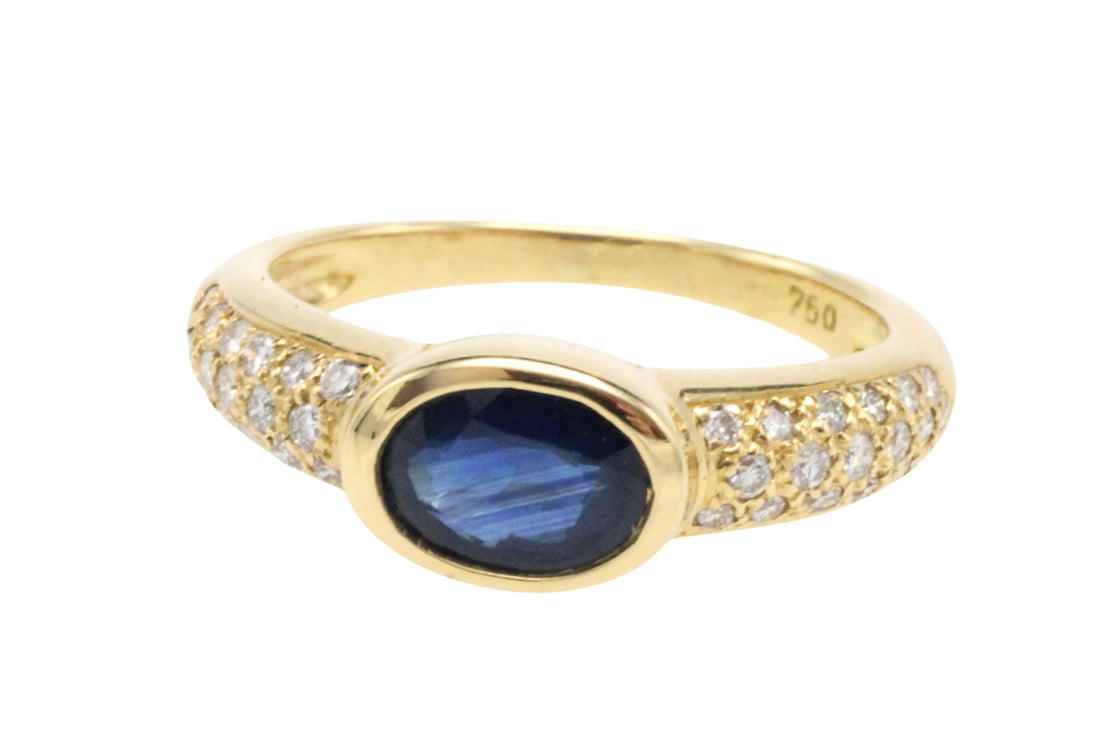 Sapphire and diamond ring in 18 carat gold