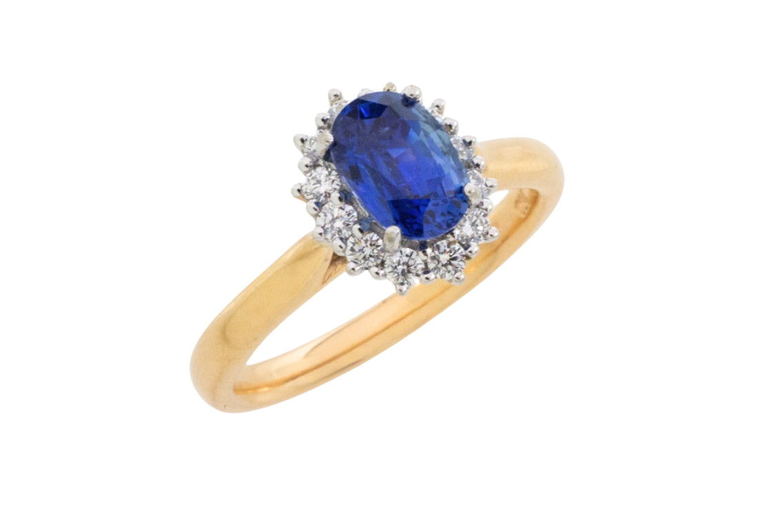 Sapphire and diamond cluster ring in 18 carat gold