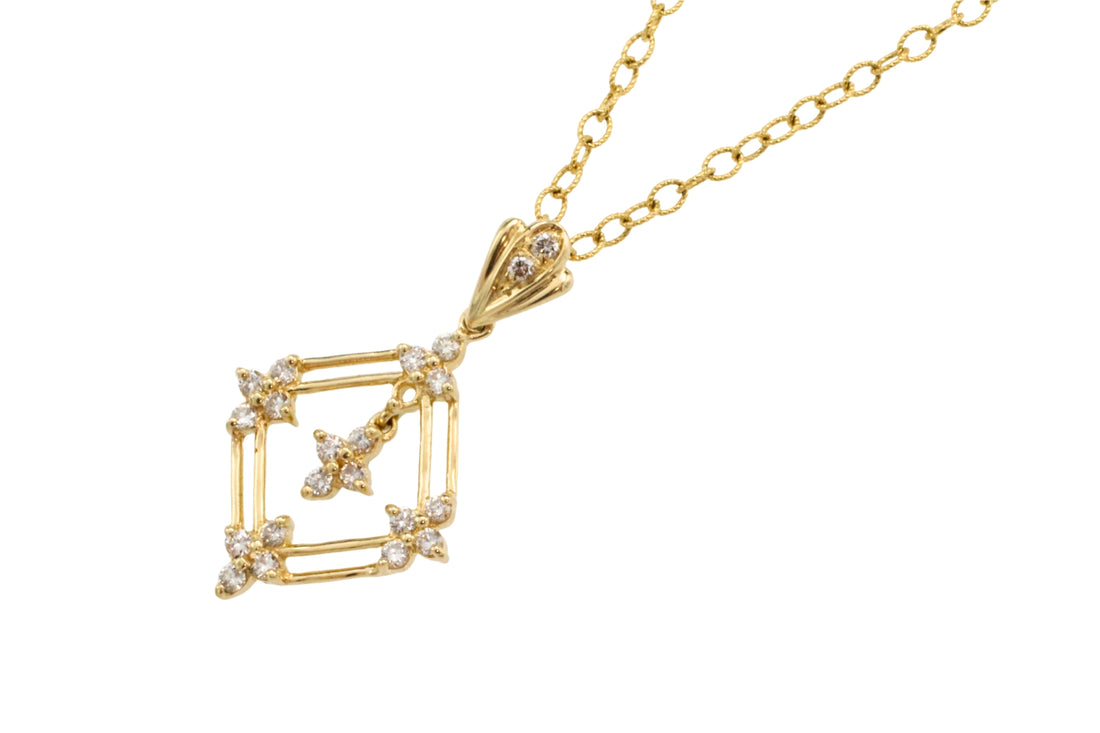 18 carat gold pendant with diamonds