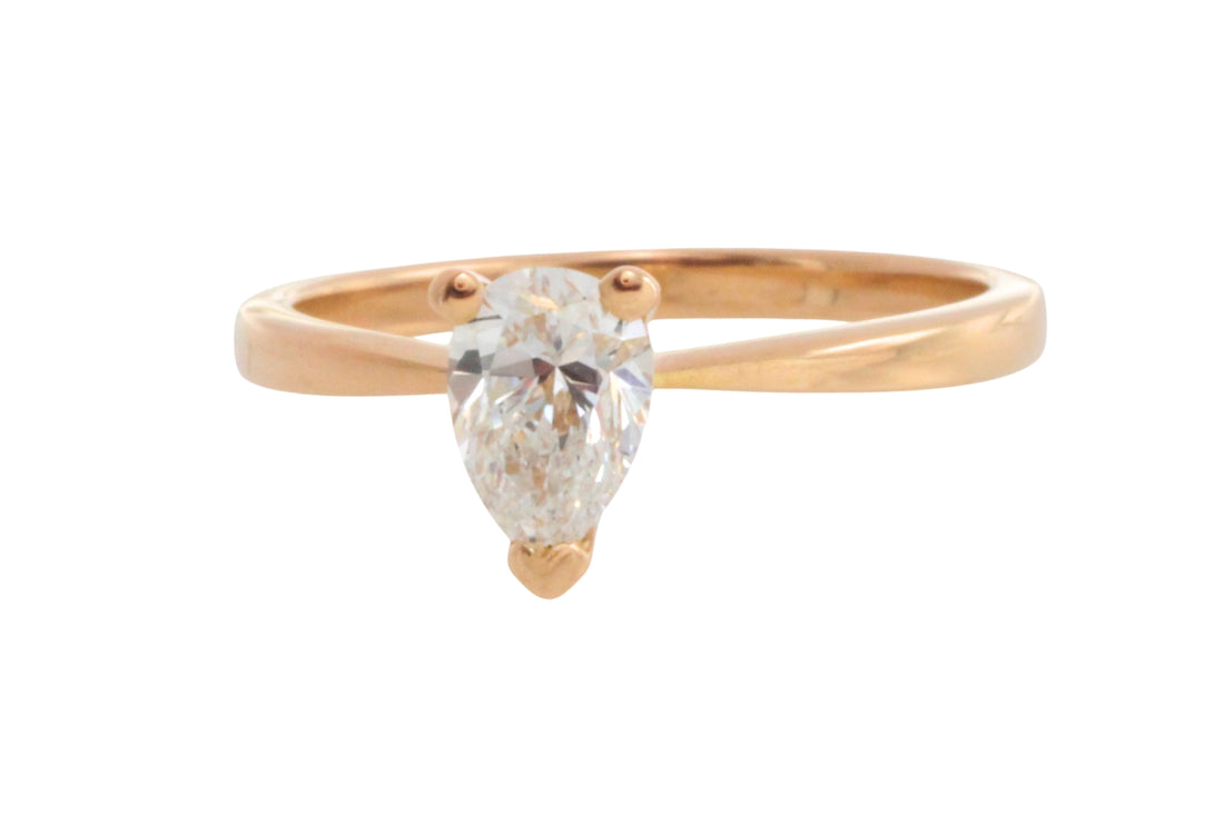 Pear cut diamond solitaire ring in 18 carat gold