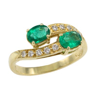 Vintage emerald and diamond crossover ring