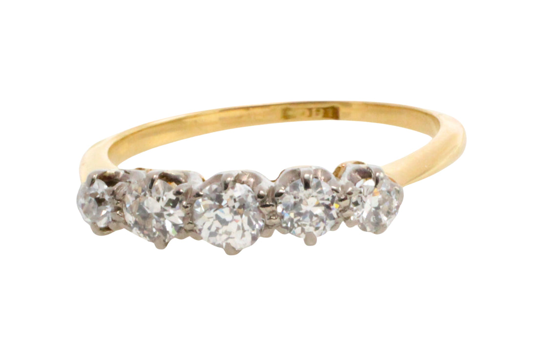 Five stone old cut diamond ring in 18 carat gold