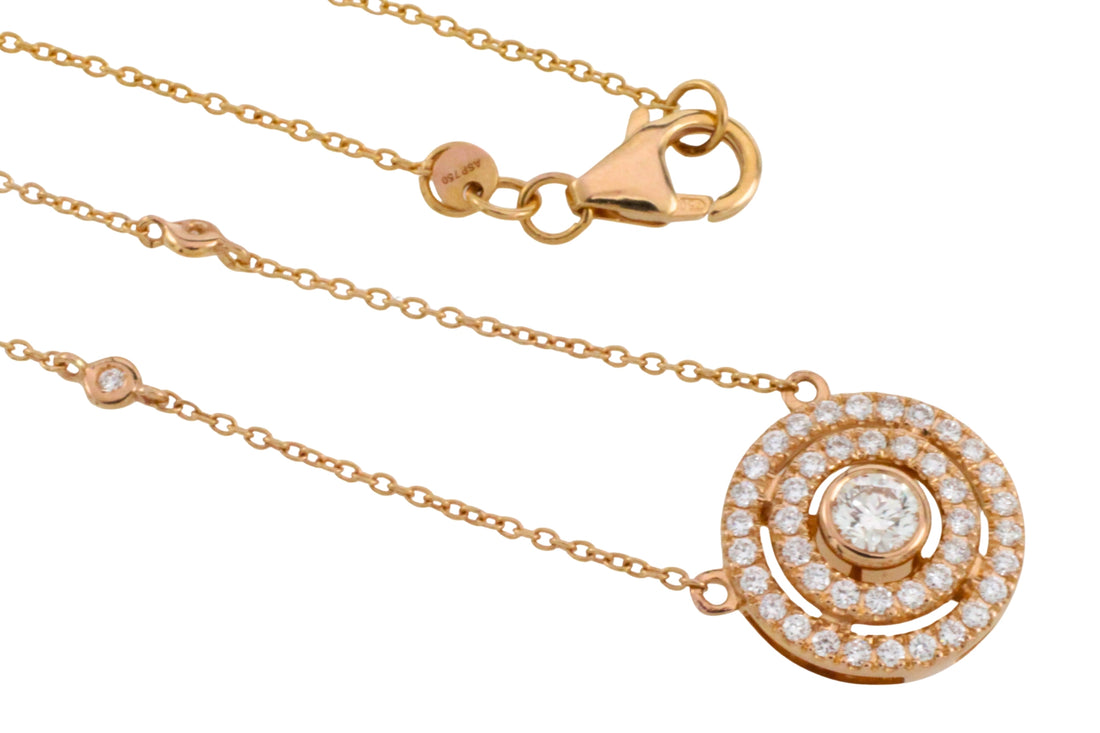 Diamond pendant and chain in 18 carat gold