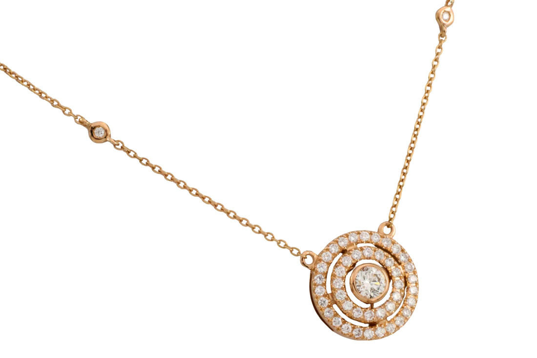 Diamond pendant and chain in 18 carat gold