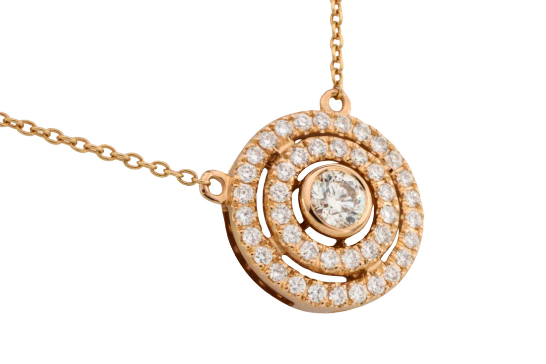 Diamond pendant and chain in 18 carat gold