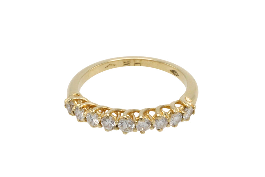 Diamond half eternity band in 18 carat gold