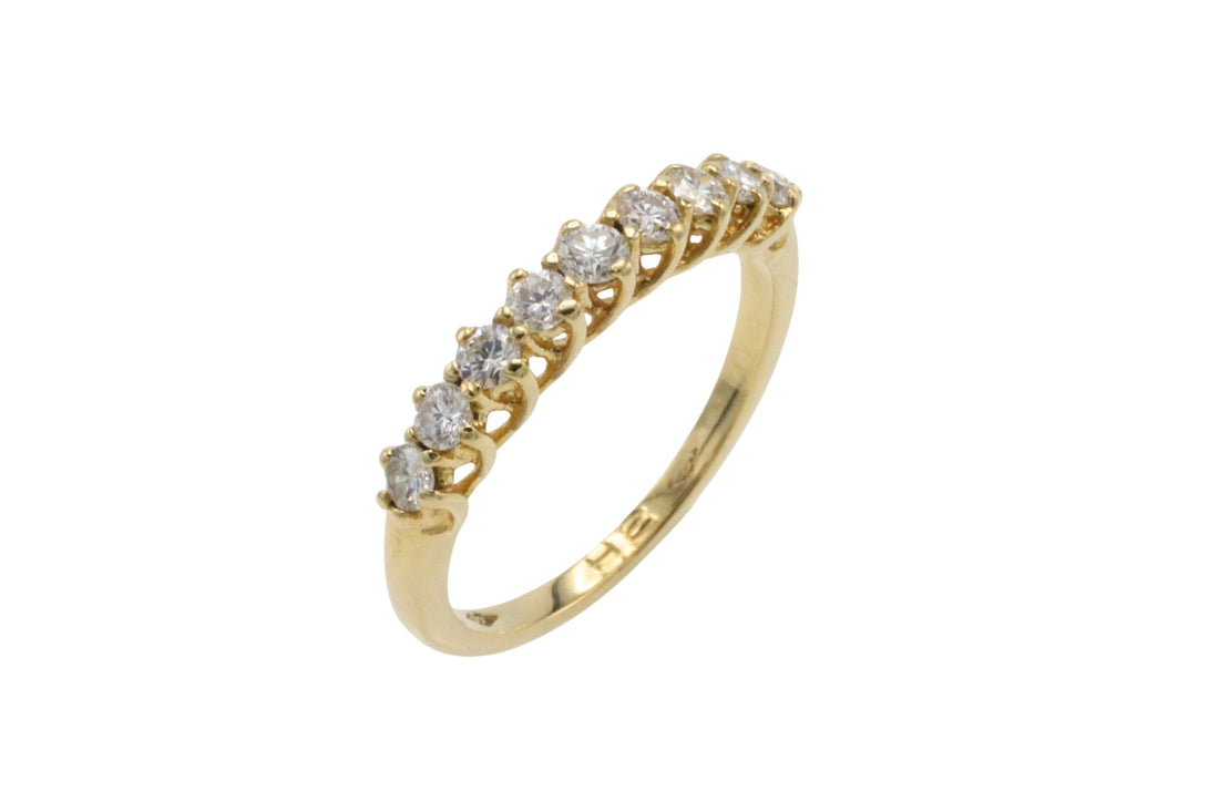 Diamond half eternity band in 18 carat gold