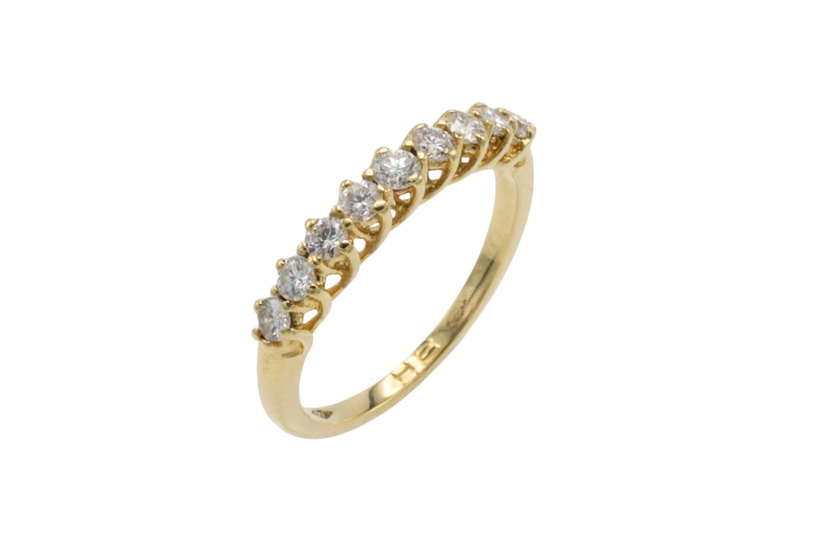 Diamond half eternity band in 18 carat gold