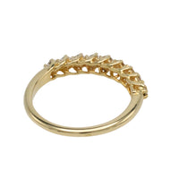 Diamond half eternity band in 18 carat gold