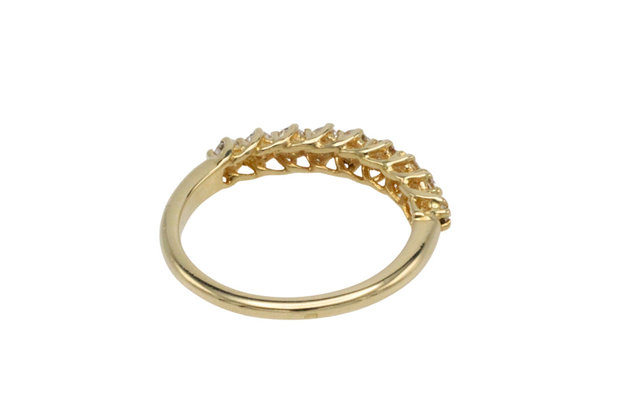 Diamond half eternity band in 18 carat gold